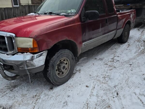 Current work truck used for junk removal operations that no longer meets GVWR and compliance requirements.