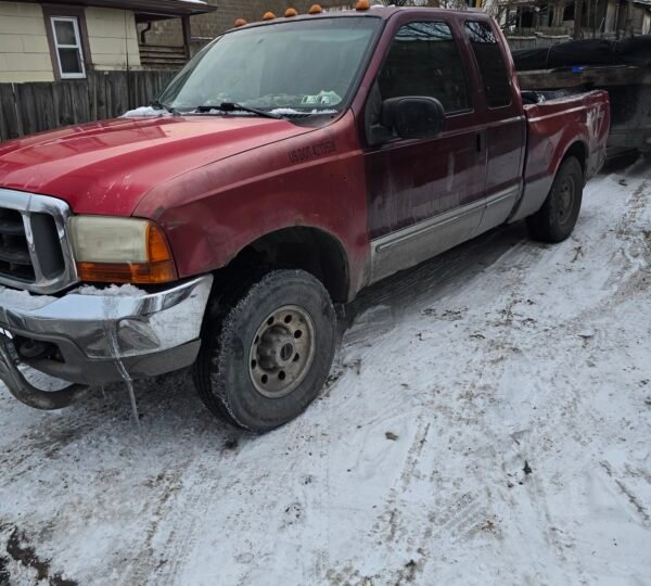 Current work truck used for junk removal operations that no longer meets GVWR and compliance requirements.